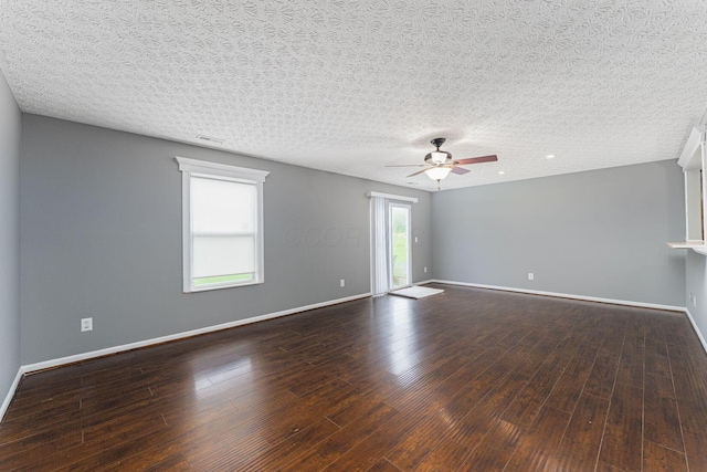 5924 Morrissey St Unit 5924E, Columbus, OH 43232 - spare room with a ceiling fan, dark wood finished floors, baseboards, and a textured ceiling