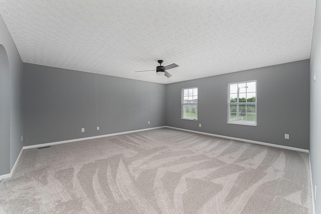 5924 Morrissey St Unit 5924E, Columbus, OH 43232 - unfurnished room with a textured ceiling, carpet floors, baseboards, and a ceiling fan