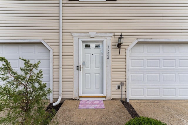 5924 Morrissey St Unit 5924E, Columbus, OH 43232 - view of exterior entry with a garage