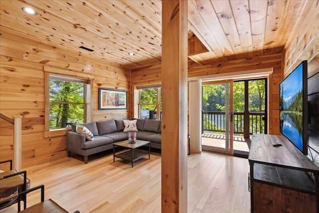 653 Natchez Ln, Sugar Grove, OH 43155 - living area featuring wooden ceiling, plenty of natural light, wooden walls, light wood finished floors, and recessed lighting