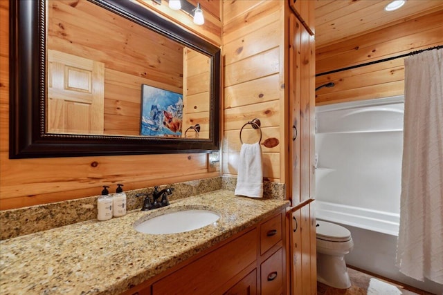653 Natchez Ln, Sugar Grove, OH 43155 - full bathroom featuring vanity, toilet, wooden walls, and shower / tub combo with curtain
