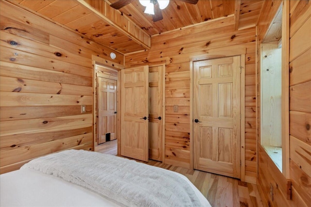653 Natchez Ln, Sugar Grove, OH 43155 - bedroom featuring wood ceiling, light wood-type flooring, and wooden walls