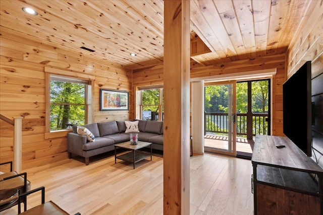 653 Natchez Ln, Sugar Grove, OH 43155 - living area featuring wood ceiling, plenty of natural light, wooden walls, light wood-style flooring, and recessed lighting