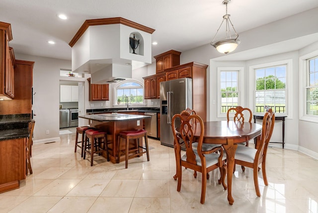 5360 Smothers Rd, Westerville, OH 43081 - dining room featuring washing machine and clothes dryer, baseboards, and recessed lighting