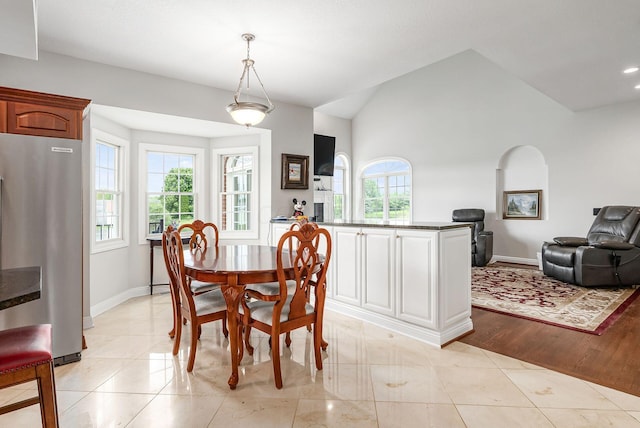 5360 Smothers Rd, Westerville, OH 43081 - dining area with healthy amount of natural light, vaulted ceiling, and baseboards