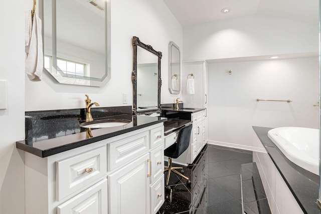 5360 Smothers Rd, Westerville, OH 43081 - bathroom featuring two vanities, recessed lighting, granite tiled floors, and baseboards