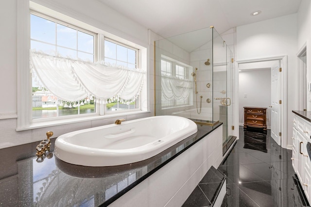 5360 Smothers Rd, Westerville, OH 43081 - bathroom featuring a bathtub, granite tiled floors, a stall shower, recessed lighting, and lofted ceiling