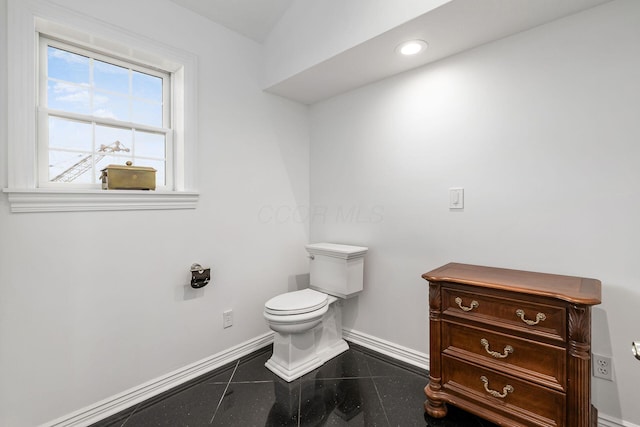 5360 Smothers Rd, Westerville, OH 43081 - half bath with baseboards, granite floors, toilet, and recessed lighting