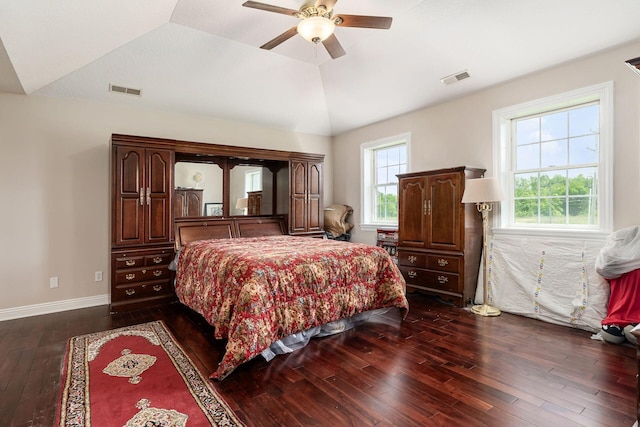 5360 Smothers Rd, Westerville, OH 43081 - bedroom featuring dark wood-style flooring, lofted ceiling, multiple windows, ceiling fan, and baseboards