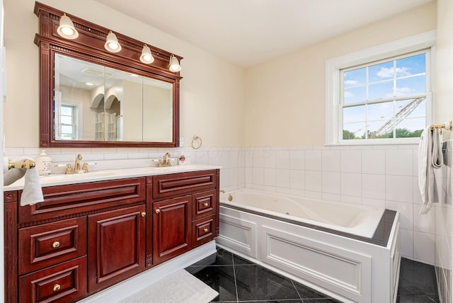 5360 Smothers Rd, Westerville, OH 43081 - bathroom with granite floors, double vanity, a garden tub, healthy amount of natural light, and tile walls