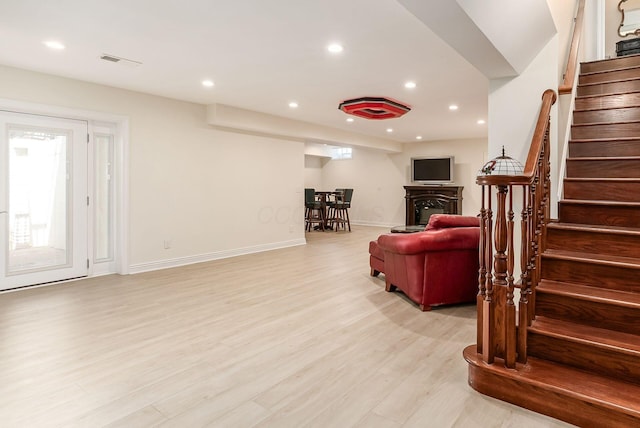 5360 Smothers Rd, Westerville, OH 43081 - living area featuring stairway, light wood-type flooring, recessed lighting, and baseboards
