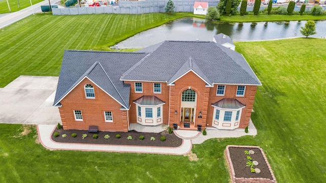 5360 Smothers Rd, Westerville, OH 43081 - view of front of house featuring a water view, brick siding, and a front yard