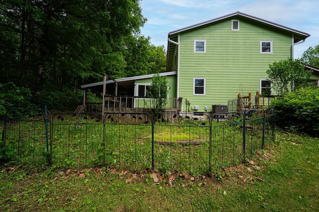 1959 Chapel Creek Rd, Chillicothe, OH 45601 - rear view of property with central AC and a deck
