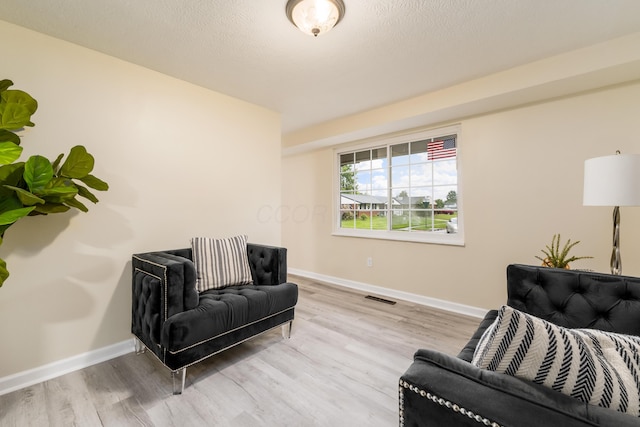 1419 Hentz Dr, Reynoldsburg, OH 43068 - sitting room featuring light wood-style floors and baseboards