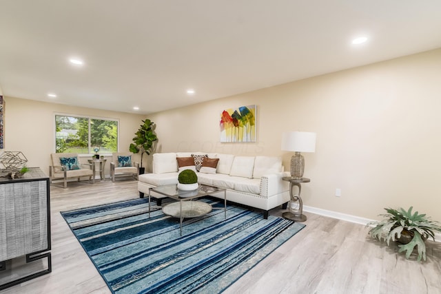 1419 Hentz Dr, Reynoldsburg, OH 43068 - living room featuring light wood finished floors, recessed lighting, and baseboards