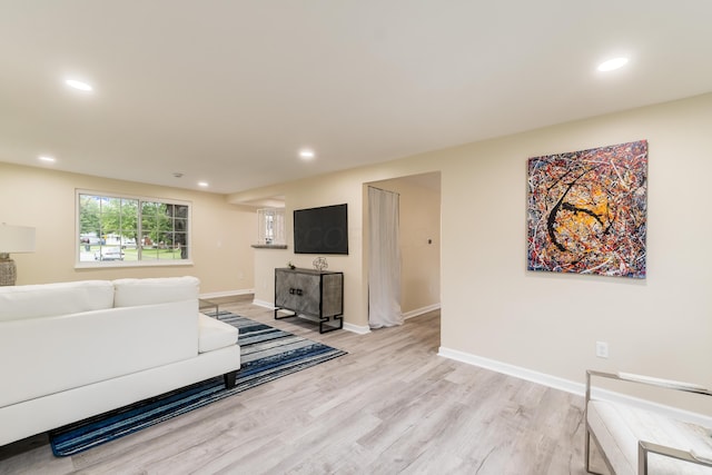 1419 Hentz Dr, Reynoldsburg, OH 43068 - living room with light wood-style flooring, recessed lighting, and baseboards