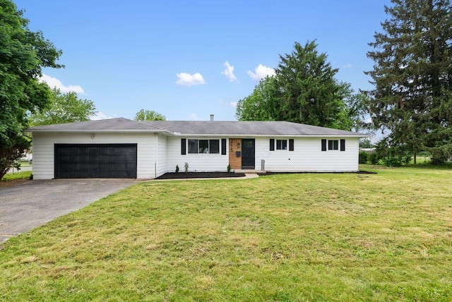 215 Stockbridge Rd, Columbus, OH 43207 - ranch-style house with a garage, driveway, and a front yard