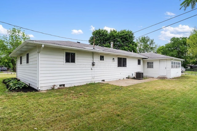 215 Stockbridge Rd, Columbus, OH 43207 - rear view of property featuring central air condition unit, crawl space, a yard, and a patio