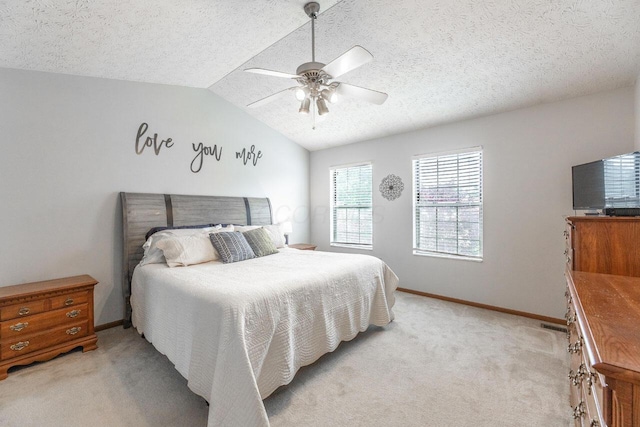 2643 Westrock Dr, Hilliard, OH 43026 - bedroom featuring light carpet, baseboards, vaulted ceiling, a ceiling fan, and a textured ceiling