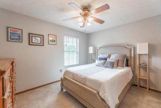 2643 Westrock Dr, Hilliard, OH 43026 - bedroom featuring light colored carpet, baseboards, a ceiling fan, and a textured ceiling