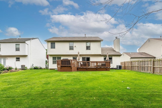2643 Westrock Dr, Hilliard, OH 43026 - rear view of property featuring a deck, cooling unit, and a chimney