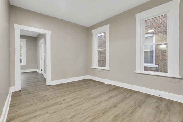 358 Saint Clair Ave, Columbus, OH 43203 - spare room featuring wood finished floors and baseboards
