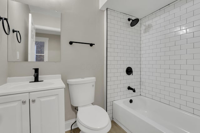 358 Saint Clair Ave, Columbus, OH 43203 - bathroom featuring toilet, vanity, and washtub / shower combination