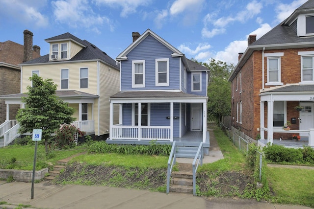 358 Saint Clair Ave, Columbus, OH 43203 - view of front of home with covered porch and stairway