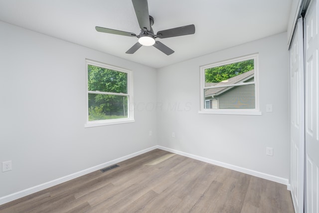 26 Crabtree Ct, Howard, OH 43028 - unfurnished bedroom featuring wood finished floors, baseboards, a closet, and ceiling fan
