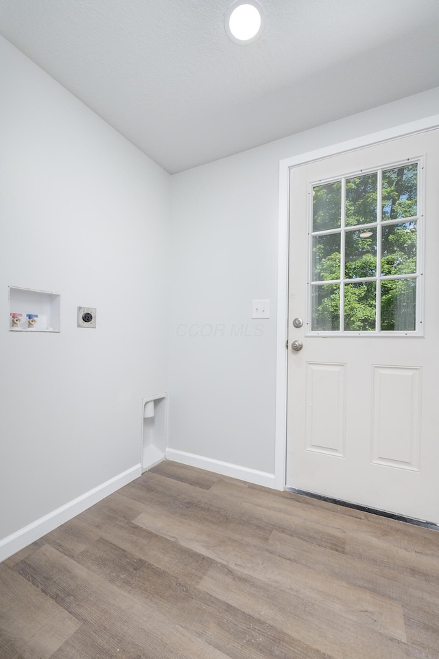26 Crabtree Ct, Howard, OH 43028 - laundry room with hookup for a washing machine, hookup for an electric dryer, wood finished floors, and baseboards
