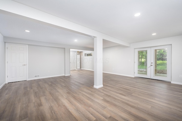 26 Crabtree Ct, Howard, OH 43028 - below grade area featuring french doors, recessed lighting, wood finished floors, and baseboards