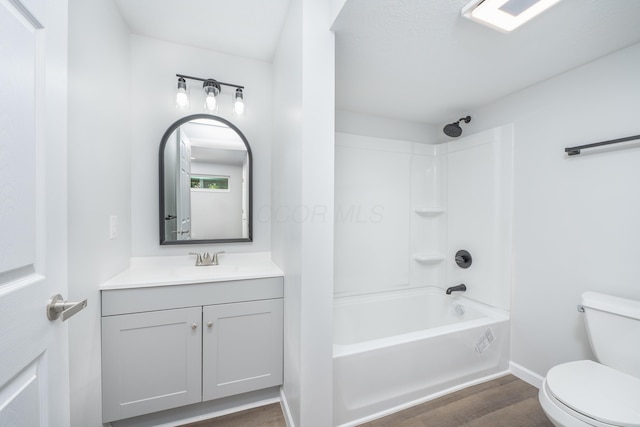 26 Crabtree Ct, Howard, OH 43028 - full bathroom with toilet, wood finished floors, tub / shower combination, vanity, and baseboards