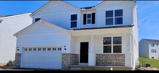 257 Whitetail Trl, Johnstown, OH 43031 - view of front of house with stone siding and a porch