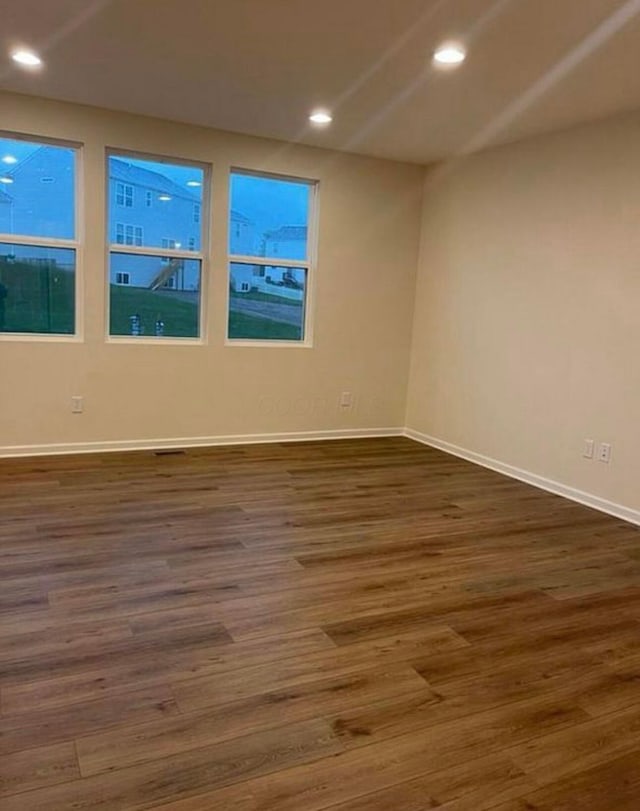 257 Whitetail Trl, Johnstown, OH 43031 - empty room with dark wood-type flooring, baseboards, and recessed lighting