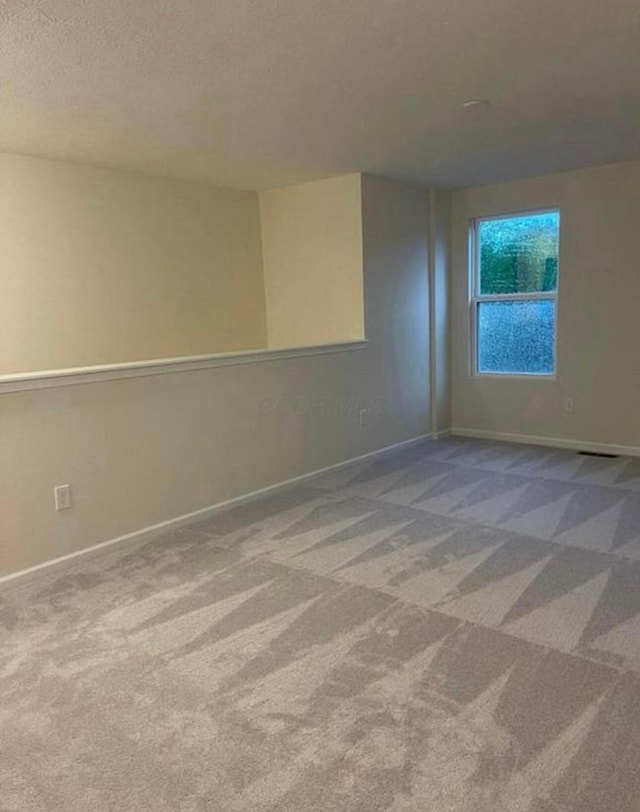 257 Whitetail Trl, Johnstown, OH 43031 - empty room featuring carpet and baseboards