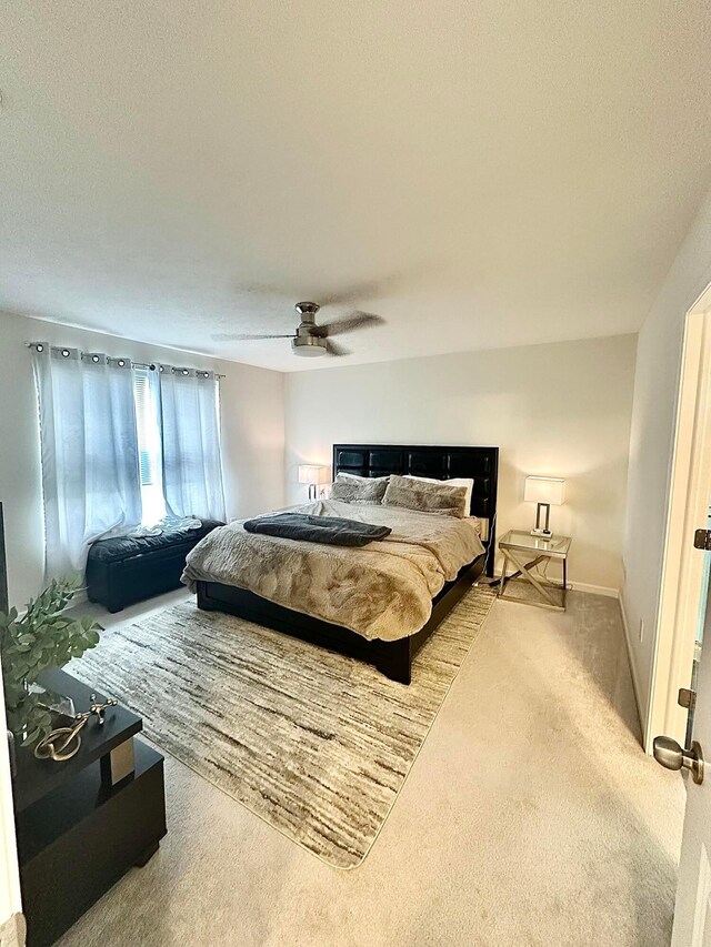 257 Whitetail Trl, Johnstown, OH 43031 - bedroom featuring carpet flooring, ceiling fan, and baseboards