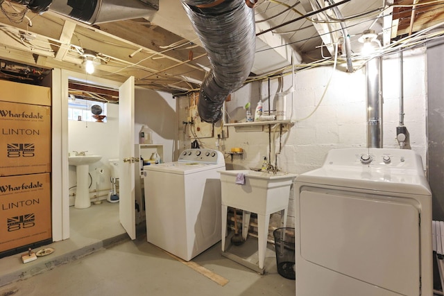 249 Blenheim Rd, Columbus, OH 43214 - basement featuring washing machine and dryer and a sink