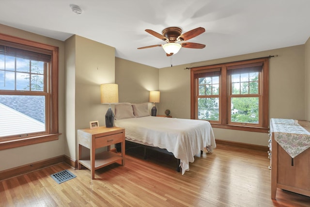 249 Blenheim Rd, Columbus, OH 43214 - bedroom featuring baseboards, light wood-style flooring, and a ceiling fan