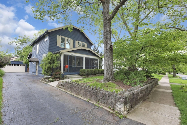 249 Blenheim Rd, Columbus, OH 43214 - view of front of home with a sunroom and a garage