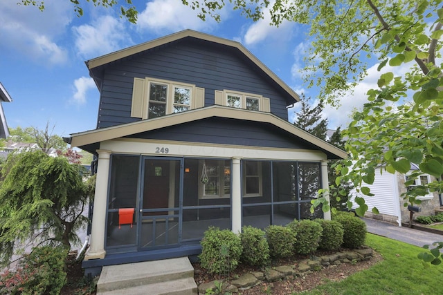 249 Blenheim Rd, Columbus, OH 43214 - view of front of property featuring a sunroom and entry steps