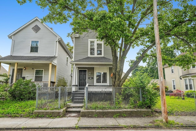 112 S Cypress Ave, Columbus, OH 43222 - view of front of property with a porch and a fenced front yard