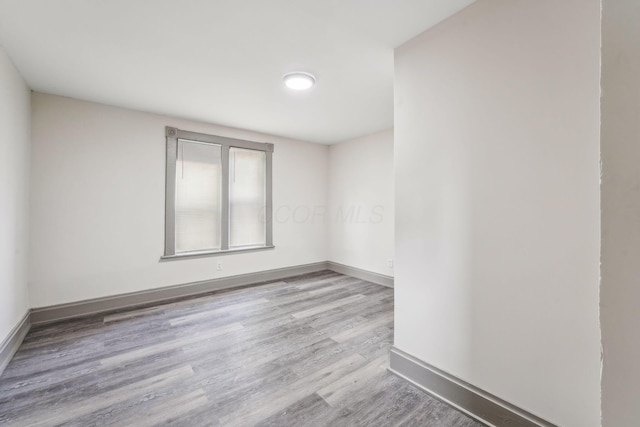 112 S Cypress Ave, Columbus, OH 43222 - unfurnished room with wood finished floors and baseboards