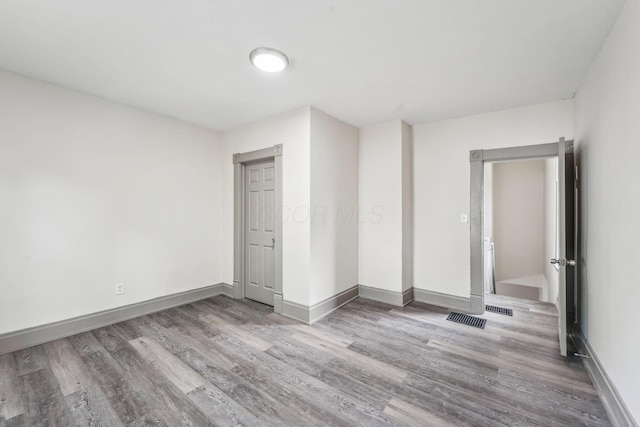 112 S Cypress Ave, Columbus, OH 43222 - empty room featuring wood finished floors and baseboards