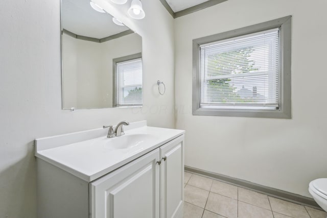 112 S Cypress Ave, Columbus, OH 43222 - bathroom featuring toilet, vanity, and tile patterned floors