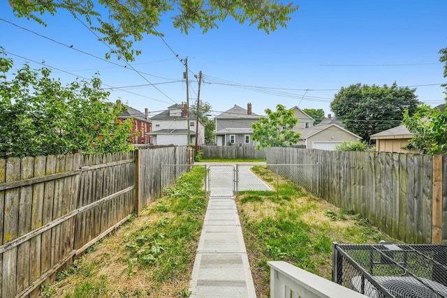 112 S Cypress Ave, Columbus, OH 43222 - fenced backyard featuring a gate and a residential view