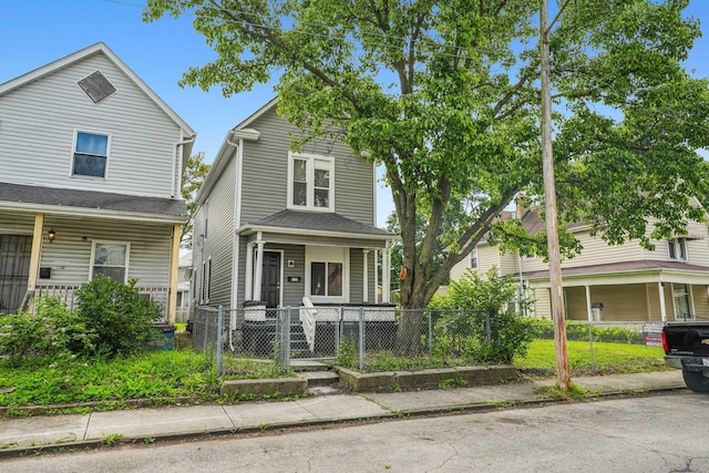 112 S Cypress Ave, Columbus, OH 43222 - view of front of home with a porch and a fenced front yard