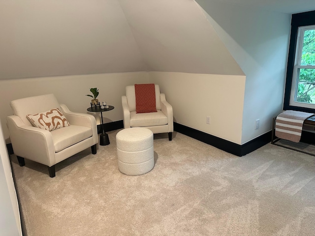 1217 Franklin Ave, Columbus, OH 43205 - living area with carpet, vaulted ceiling, and baseboards