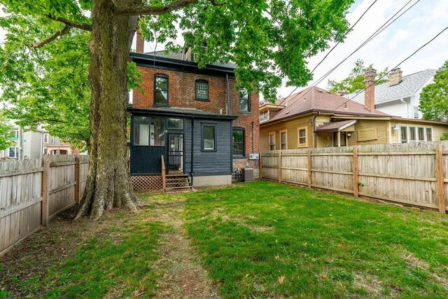 1217 Franklin Ave, Columbus, OH 43205 - rear view of house featuring brick siding and a chimney