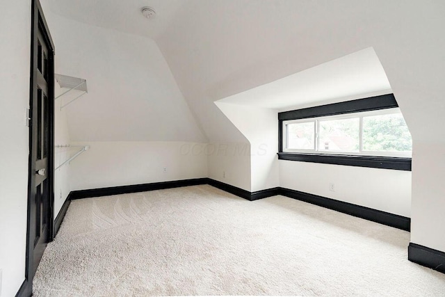 1217 Franklin Ave, Columbus, OH 43205 - additional living space with lofted ceiling, carpet, and baseboards
