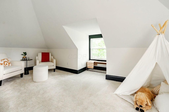 1217 Franklin Ave, Columbus, OH 43205 - sitting room featuring carpet floors, lofted ceiling, and baseboards